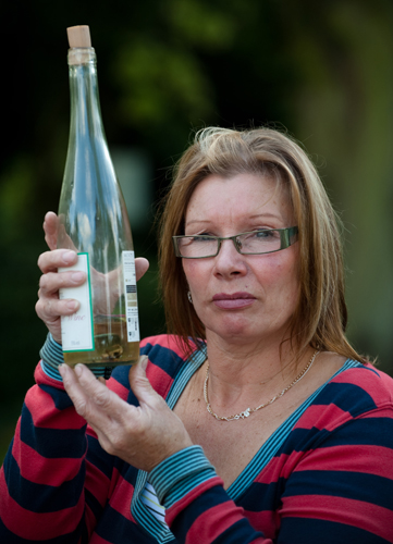 Asda frog in a wine bottle
